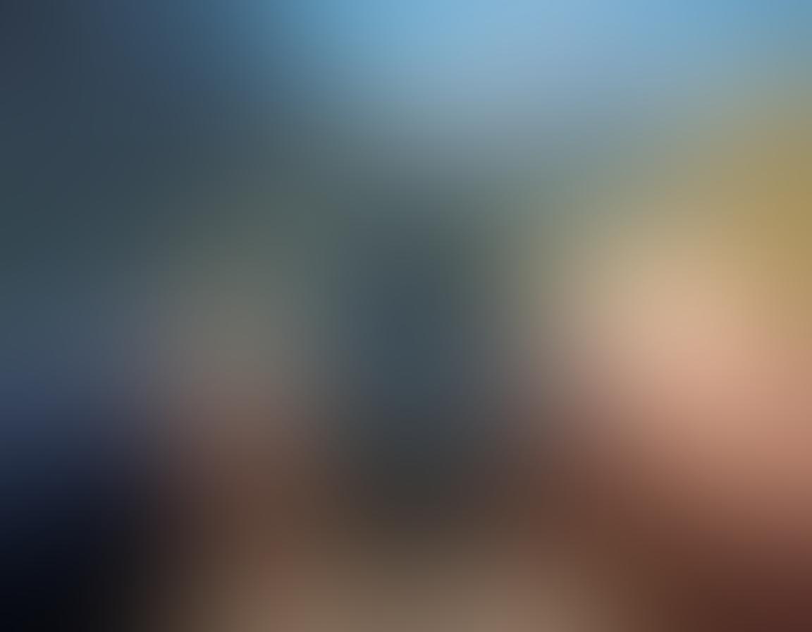 A rugged outdoor scene featuring a close-up of a Luminox watch on a person's wrist, with mountains and a bright blue sky in the background. The watch is highlighted, showcasing its durability and features, while elements like a compass, hiking gear, and a campfire add context to the adventurous setting. The atmosphere is vibrant and energizing, emphasizing exploration and functionality. super-realistic. vibrant colors. outdoor aesthetic.